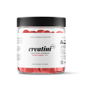 Creatine gummies container and a strawberry Daiquiri cocktail on a white background